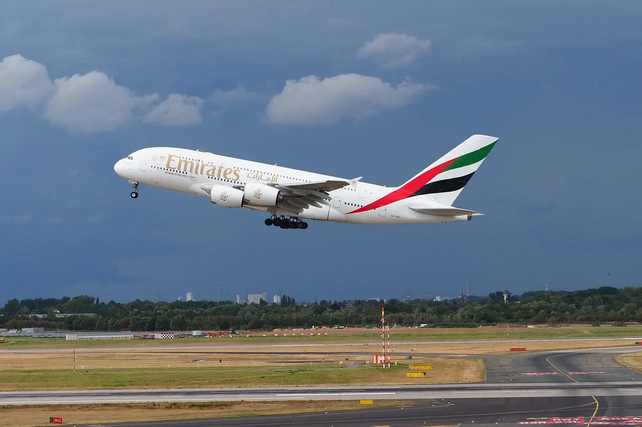 Emirates Airline A380 airbus is taking off from and airport