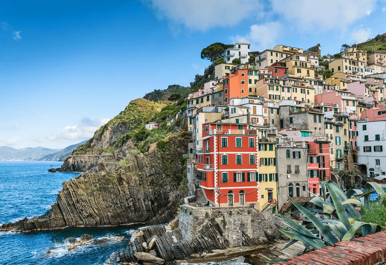 colorful houses of Cinque Terre stacked up on the rocks overlooking the sea