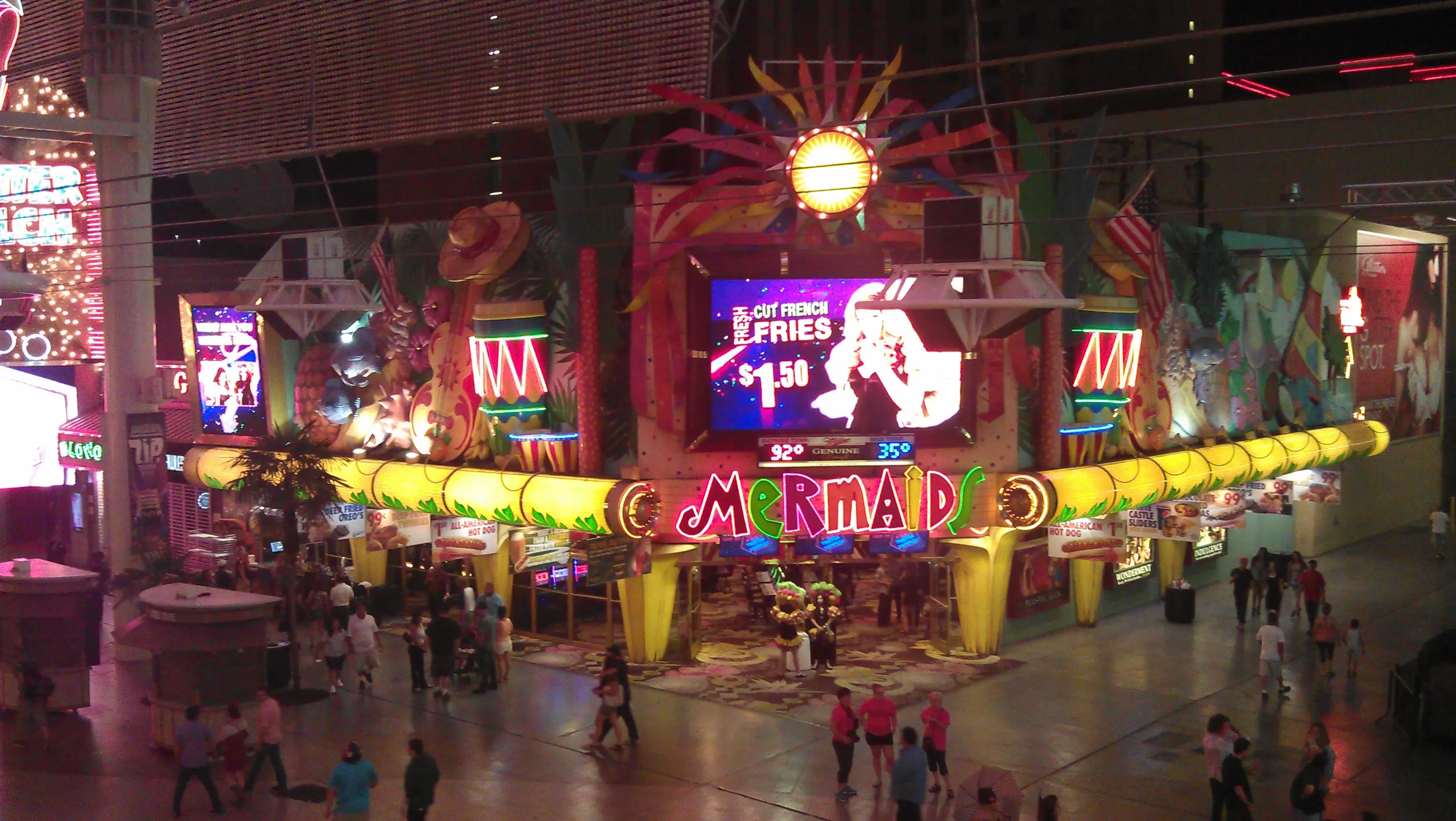 historic church with old petroleum lamp post in front sitting on the bank of a lagoon in golden hour of the day