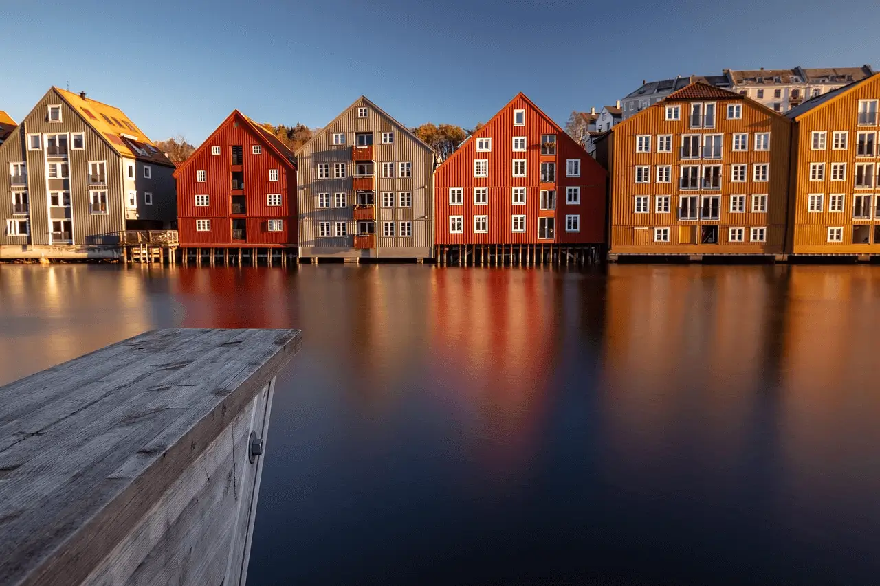Colorful houses on the river bank in Norway