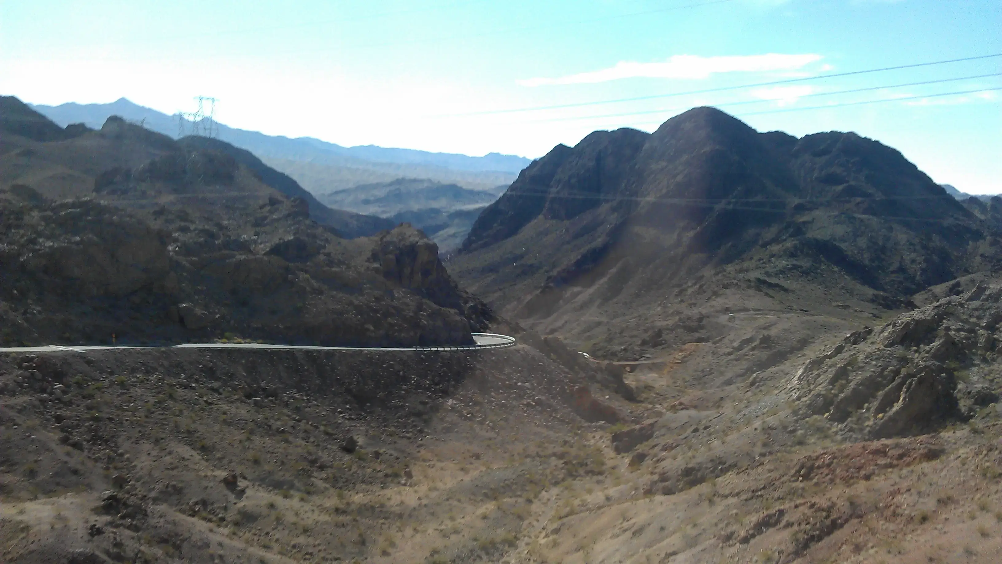 mountain road through green hills